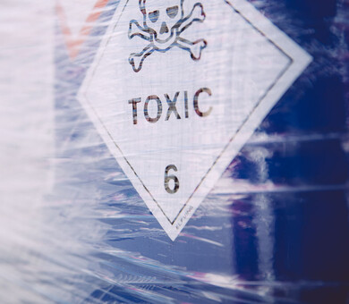 Hazardous waste barrel and label